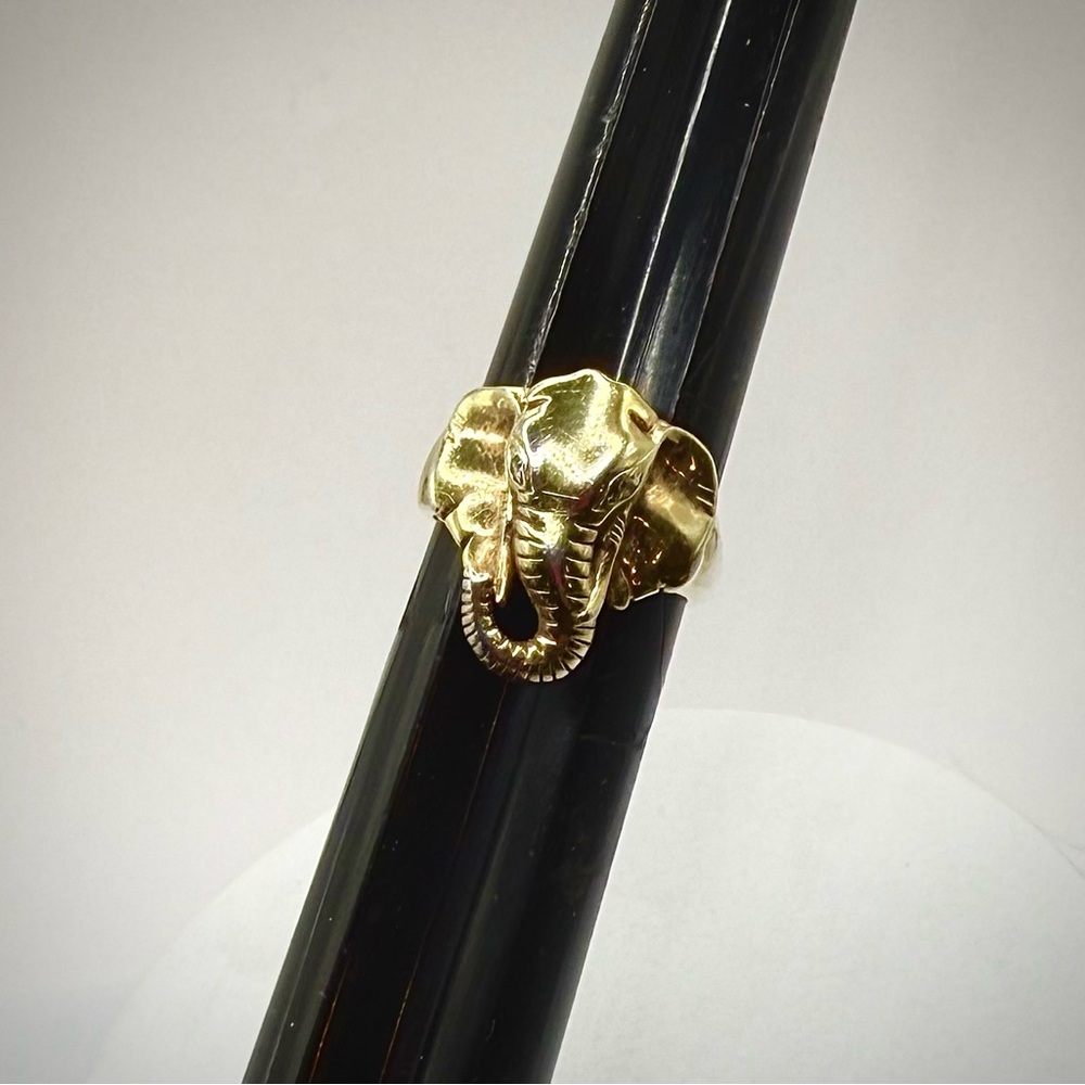 Cute elephant ring marked sterling silver with a gold tone coating.